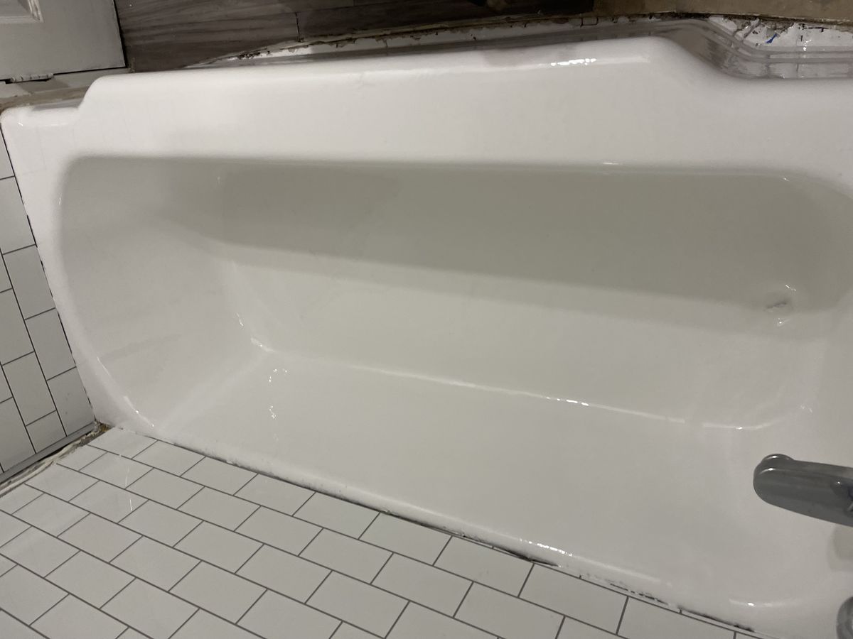 Bathtub after professional reglazing with a glossy finish in Westland, MI